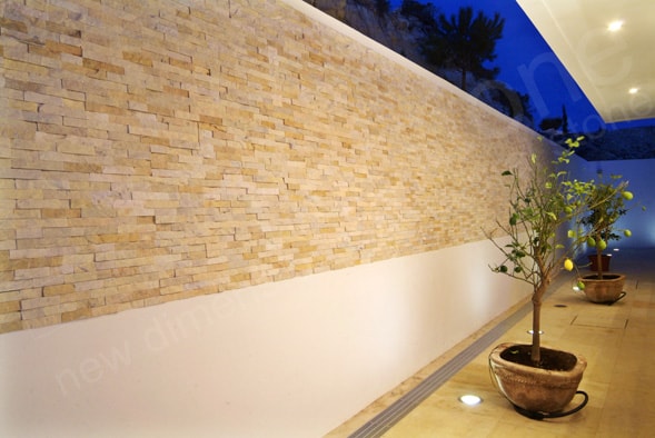 Norstone Ivory Rock Panels used in an outdoor courtyard of a vacation home in Cyprus